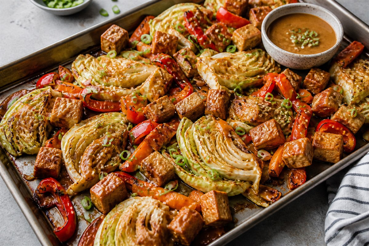 Ginger peanut sauce tofu sheet pan dinner with cabbage lifestyle food photo