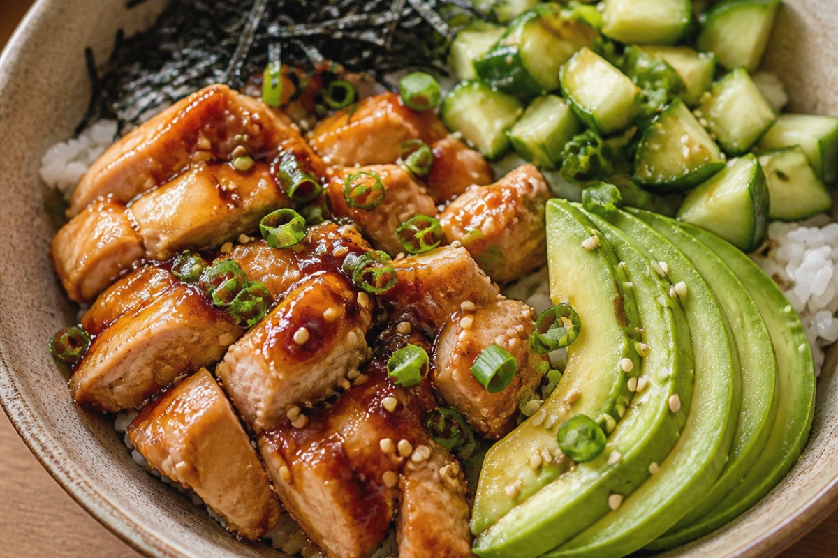 Sesame Szechuan Sauce Tofu Sushi Bowl with red bell pepper finished recipe with vegetables and sauce